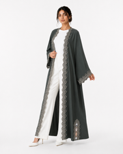 ‎ ‎The green abaya