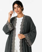 ‎ ‎The green abaya