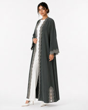 ‎ ‎The green abaya